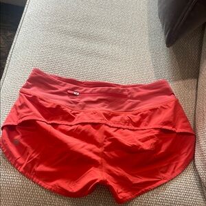 Women's Red Lululemon Shorts Size 4 speed ups 2.5”